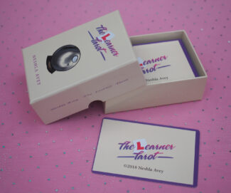 Neshla Avey the learner tarot cards on pink background